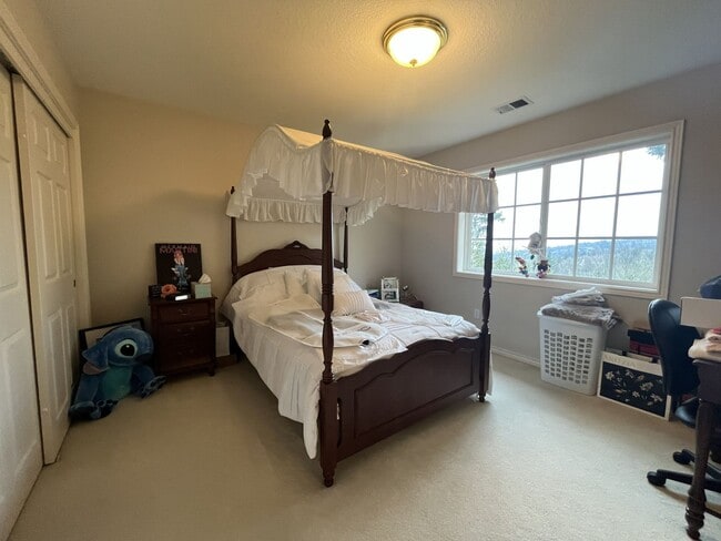 Building Photo - Executive-Style Northwest Heights Home with Forest Views and Refined Architectural Details