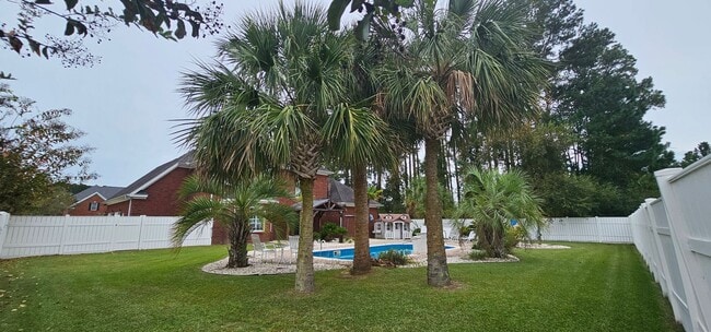 Building Photo - “Elegant 5-Bed Executive Home with Pool – ...