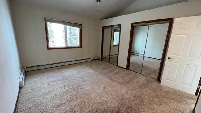 Building Photo - Lovely 2 Bedroom Townhouse Condo W/Garage - Corner Lot - Call Today!