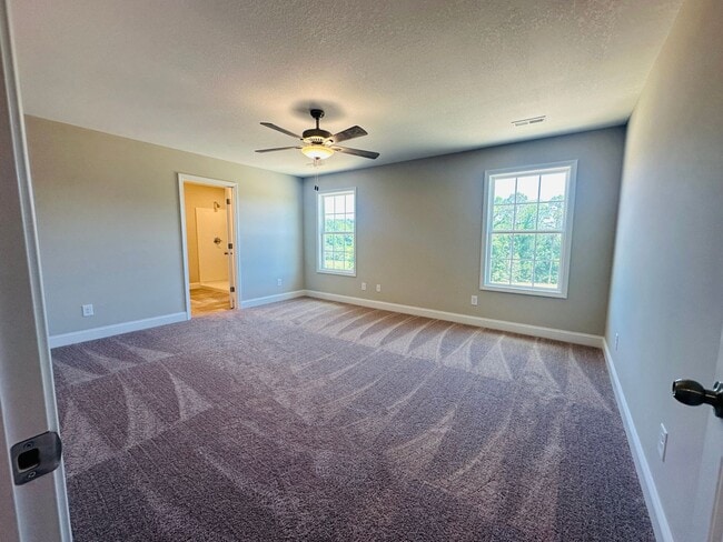 Building Photo - Beautiful Like-New 3 bed/2.5 bath w/ 2-car garage & fenced in backyard available June 24th!