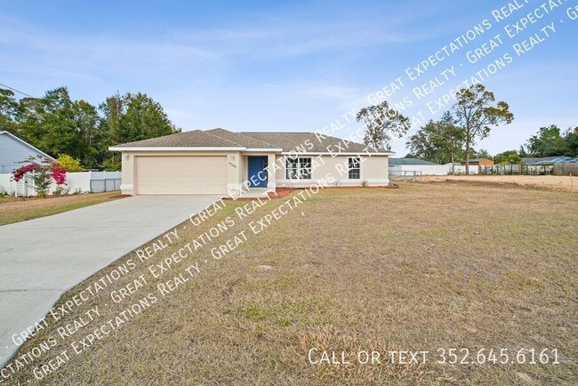 Building Photo - Fenced & Tiled 3/2/2 Summerfield Home For ...