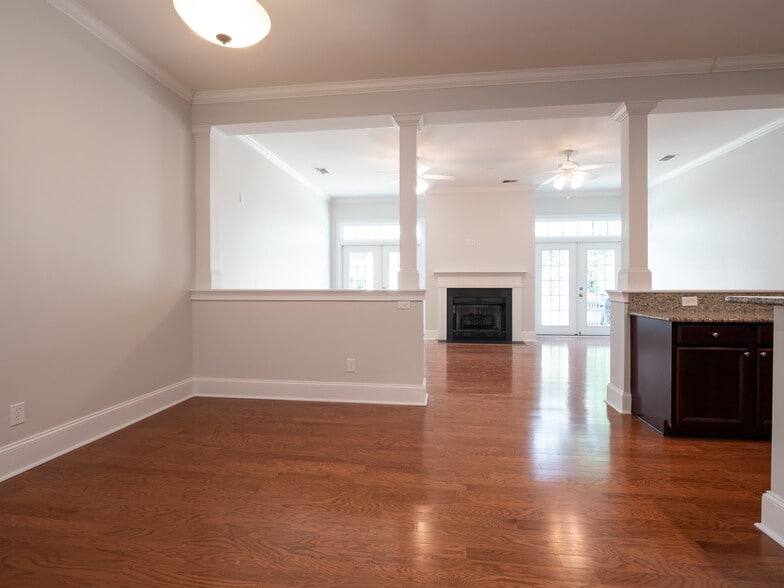 view from end of entry hall to kitchen table and family room areas - 1814 Tennyson Row