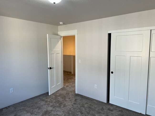 Building Photo - ALMOST NEW CONSTRUCTION/ 4 BEDROOM IN NEWER UPCOMING NEIGHBORHOOD