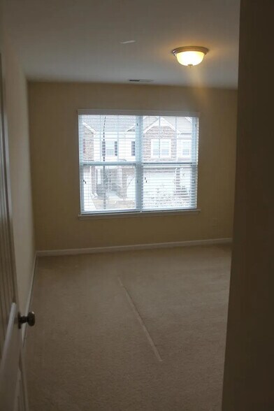 Building Photo - Room in Townhome on Skyros Loop