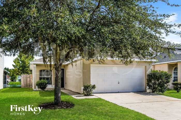 Building Photo - 6565 Gentle Oaks Dr