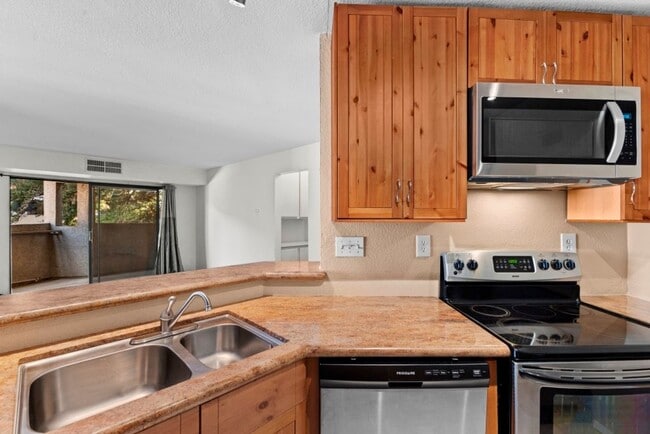 Building Photo - Stylish 1-Bed Condo with Balcony, Garage & Resort-Style Amenities in Mira Mesa