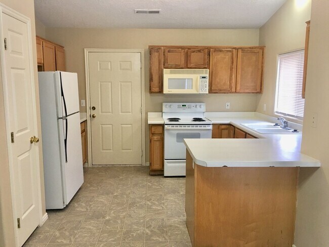 Building Photo - 1308 Millcreek Duplex