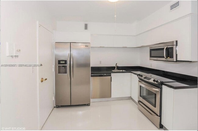 Building Photo - 5700 Collins Ave