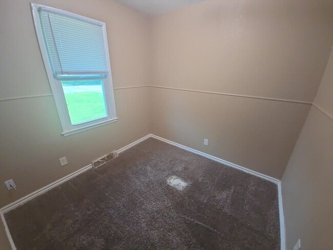 Building Photo - Charming 3-Bedroom Home with Large Yard