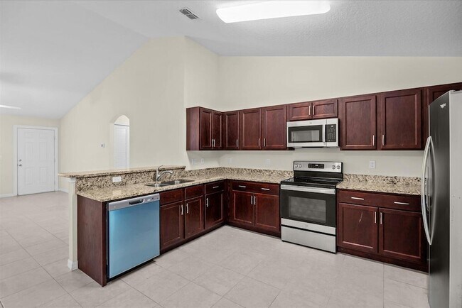 Building Photo - 8736 98th Ct
