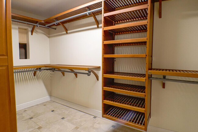 Building Photo - RARE ON MARKET , 2+den 2 1/2 bath overviewing a lake behind bell tower