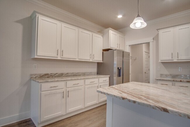 Building Photo - Spacious Cantonment Townhome with Open Layout, 2-Car Garage, Covered Back Porch & Easy Access to ...