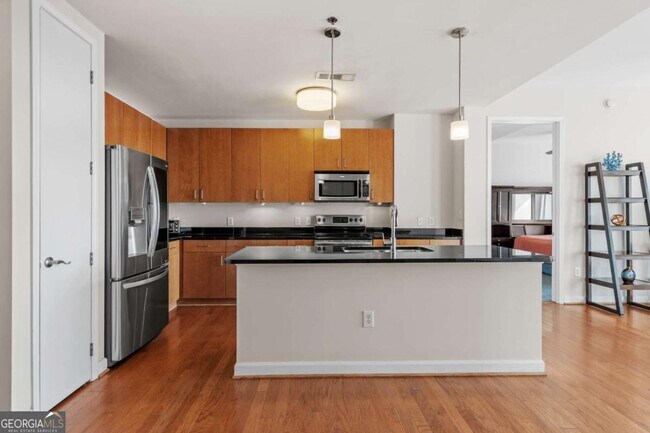 Building Photo - 711 Cosmopolitan Dr NE