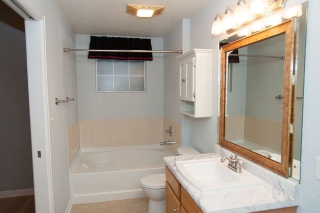 Building Photo - Updated and Bright 2B/2B with Attached Garage Now Available!