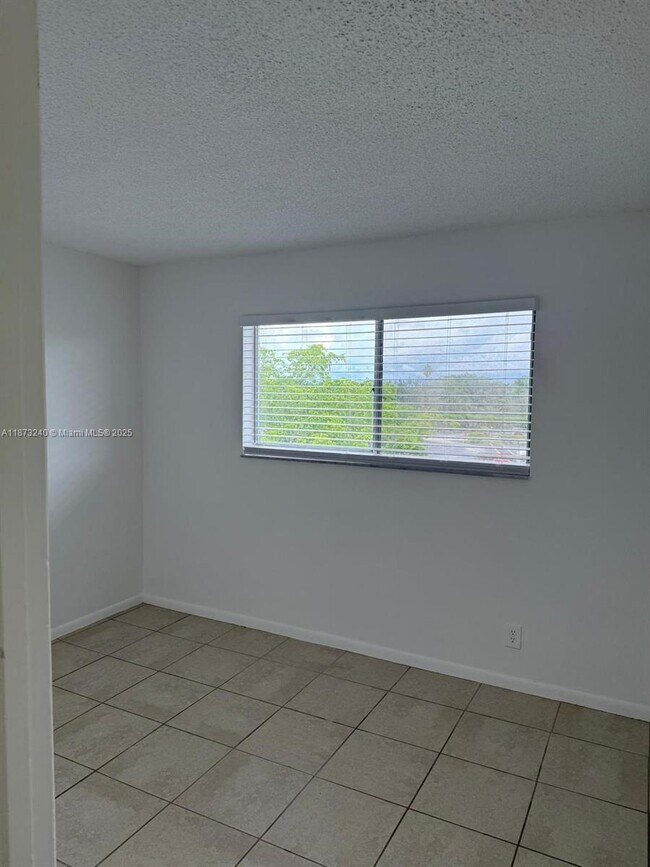 Building Photo - 8600 N Sherman Cir
