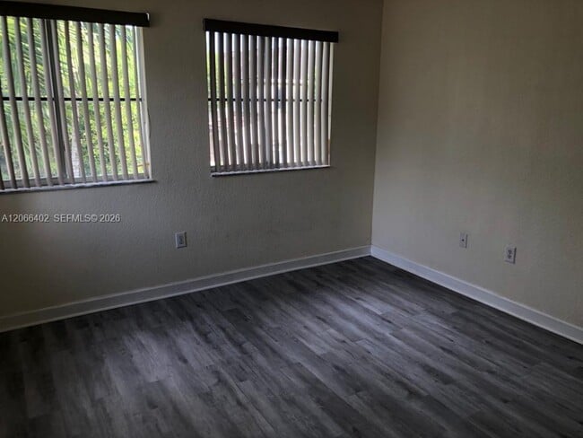 Building Photo - 5598 NW 113th Ave