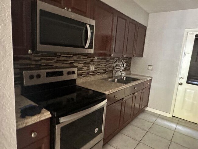 Building Photo - 3720-3726 NW 115th Way