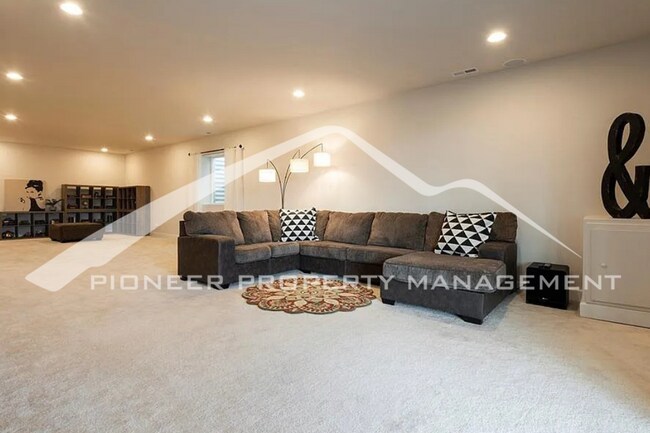 Building Photo - Stylish Main-Level Living with Finished Ba...