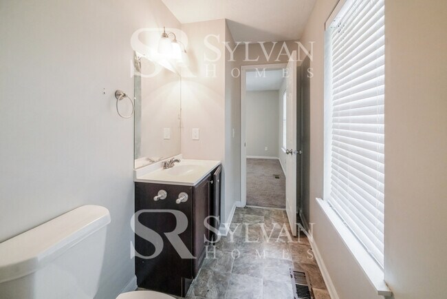 Building Photo - Immerse yourself in comfort and convenience