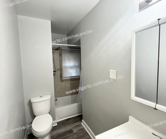 Building Photo - 6065 E 6th Pl