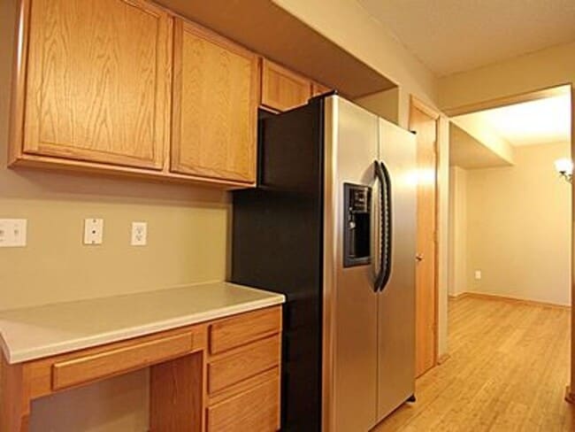 Building Photo - Great NE location -  4 bedroom 2.5 bath with attached 2 stall garage. Close to shopping & restaur...