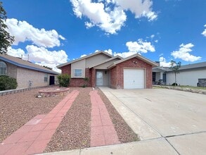 Building Photo - East El Paso 4bed/2bath All Tile Flooring!