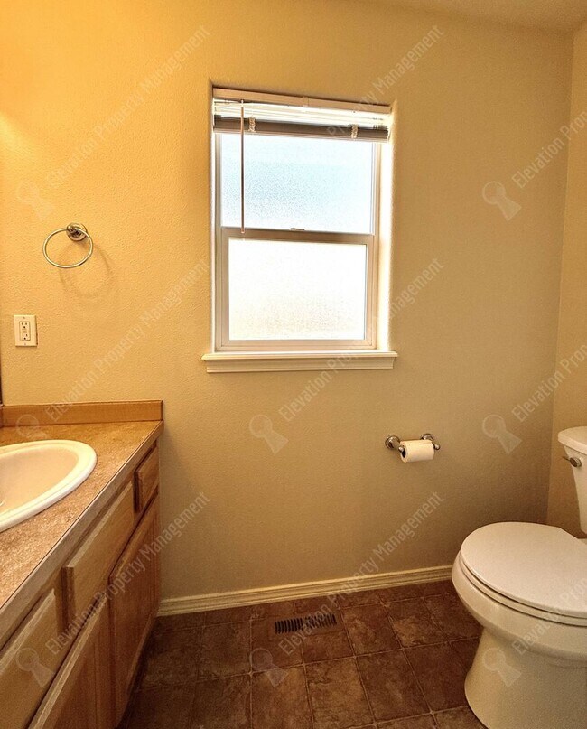 Building Photo - Updated 3 BR/2.5  BA with new flooring and paint!