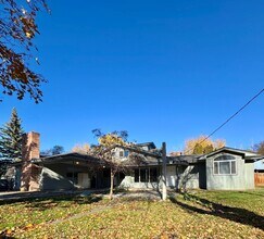 Building Photo - Expansive Updated Home with Creek Views & Prime Location