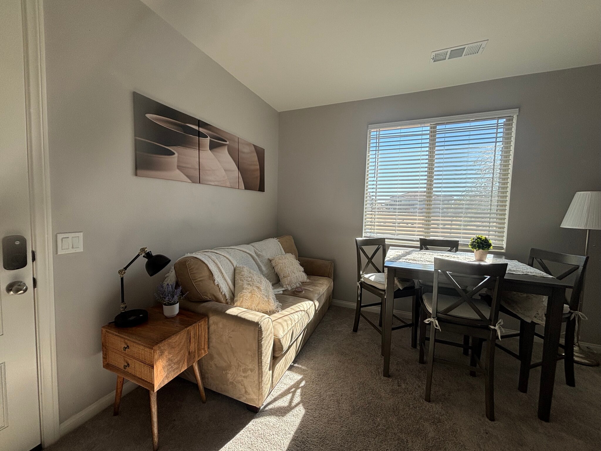 living room with plenty of natural light - 32914 Guinness Way