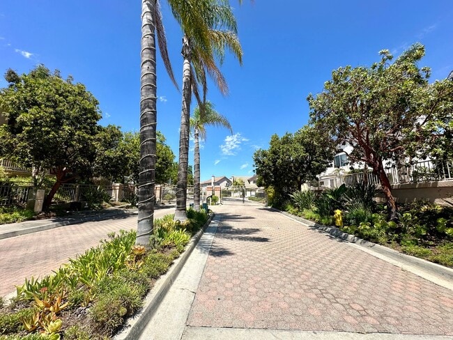 Building Photo - Corner Unit Two Story Townhome in the Beau...