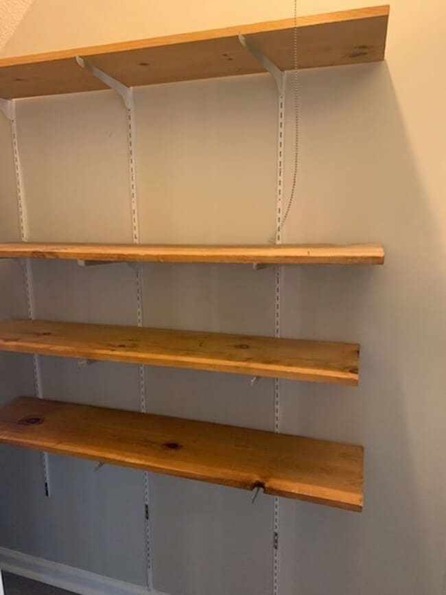 Building Photo - This charming 3-bed, 2.5-bath townhome is available for rent.