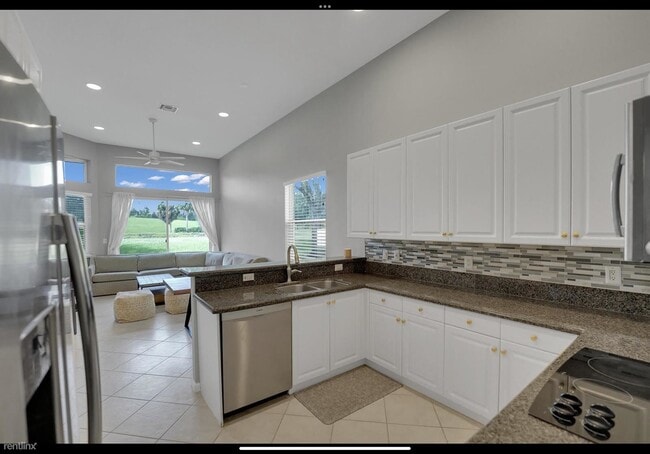 Building Photo - 4 br, 2.5 bath House - 7922 Monarch Ct