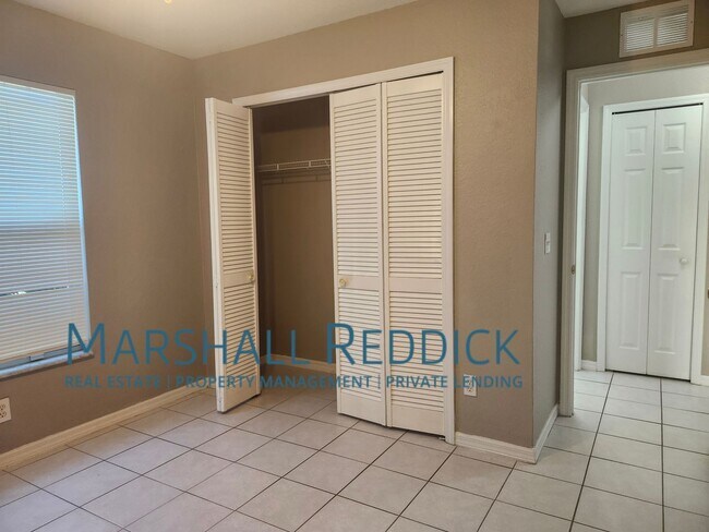 Building Photo - 3 BED 2 BATH SINGLE FAMILY HOME ON FRESH WATER CANAL WITH DOCK
