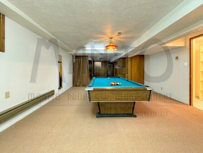 Building Photo - **COMING SOON** Beautiful Down River Brick Bungalow with River Views