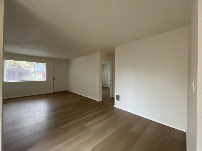 Building Photo - Inviting 2 Bedroom Home with Open Layout, Stainless Steel Appliances & Private Outdoor Retreat