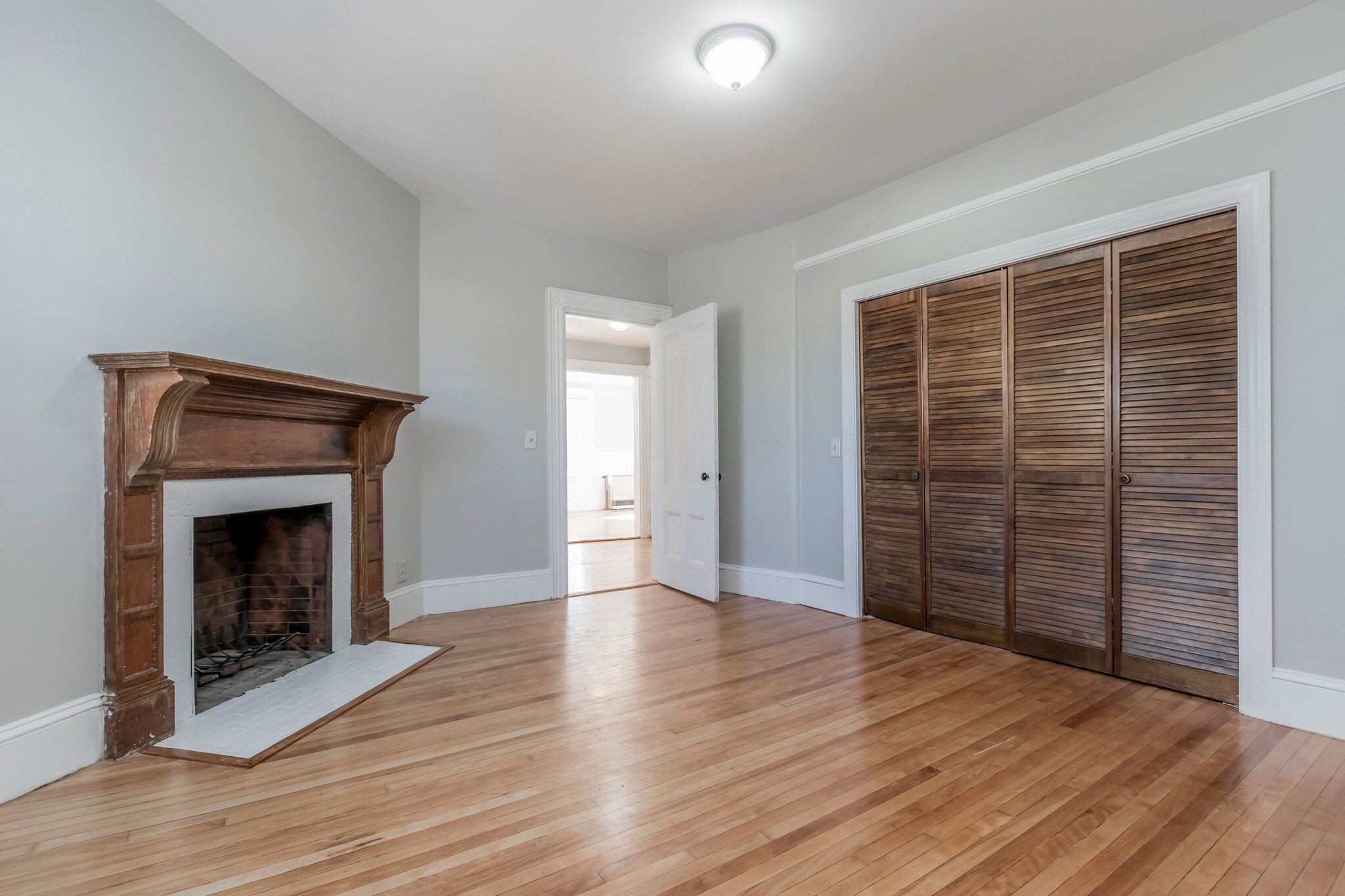 Bedroom #1 - has a non-functioning fireplace. - 221 Bridge St