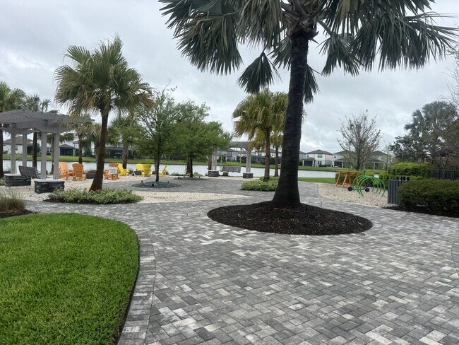 Building Photo - Lakeview Living with Bonus Flex Space & Resort-Style Amenities