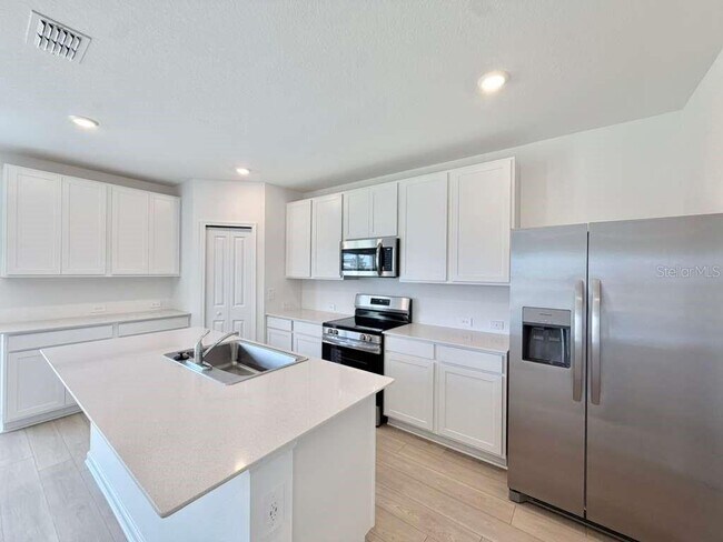 Building Photo - 6472 Domizio Dr