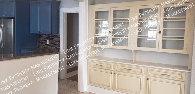 Building Photo - Charming Fully Renovated 4-Bedroom Home in...