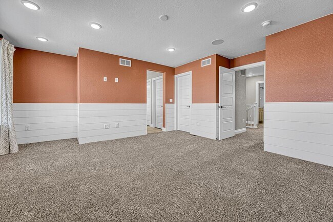 Building Photo - Former Model Home - Superb townhome in great location!