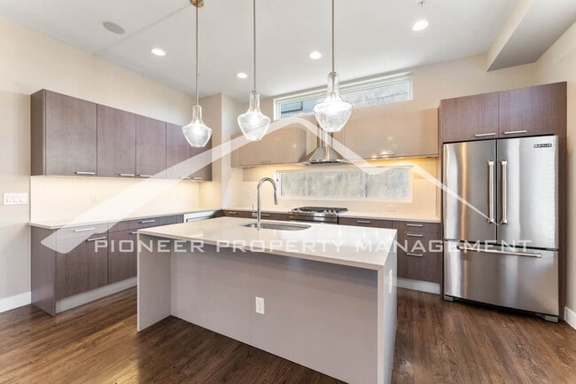 Building Photo - Fantastic Townhome with A Roof Top Patio, Attached Garage, and Central AC!