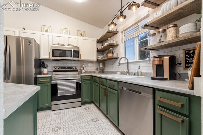 Building Photo - Maintenance free 2 bedroom, 2 full bath condo! Upper unit