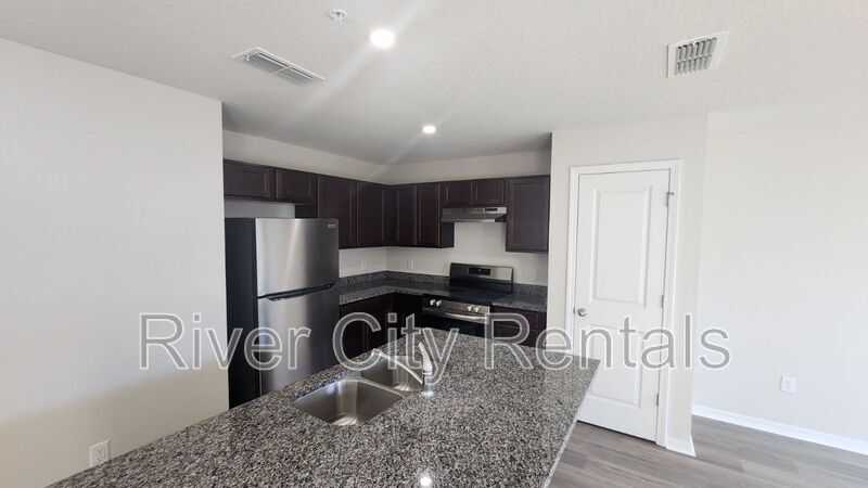 Building Photo - 6541 Sweetbay Ln