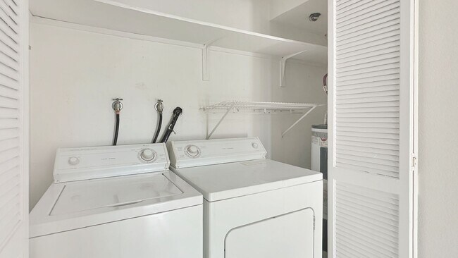 Building Photo - Exceptional Corner Unit w/ Wraparound Sout...