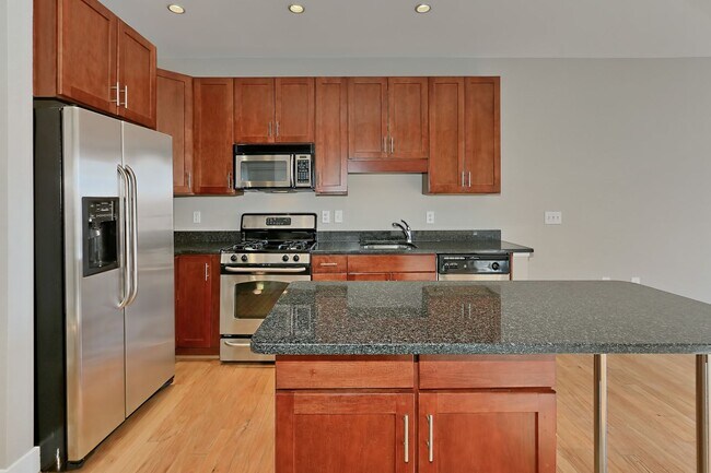 Building Photo - Unique Two-Level Condo