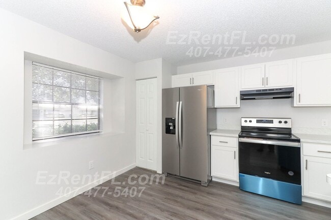 Building Photo - Summer Special! Charming 2 Bed/2 Bath Vill...