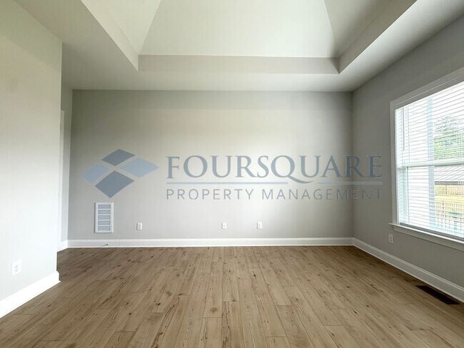 Building Photo - Elegant 4-Bed / 3.5-Bath Home with Main-Level Primary Suite, Quartz Kitchen & 3-Car Garage – In H...