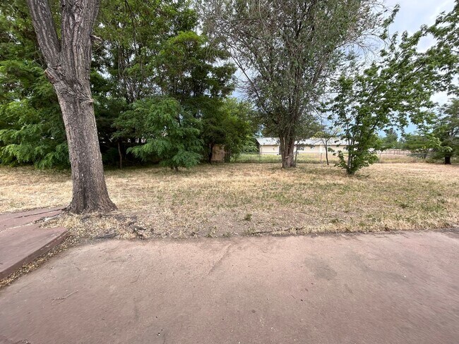 Building Photo - Corner Lot Home w/ Giant Yards, Covered Patio & Minutes to Boise Spectrum Center!