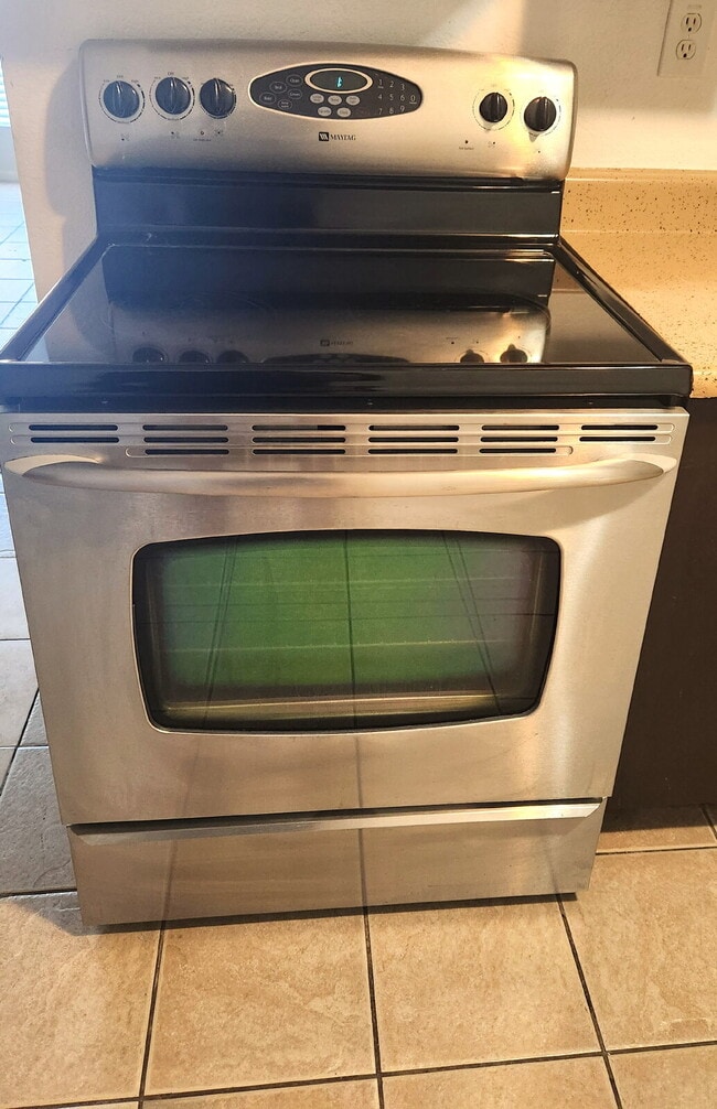 Building Photo - FIRST FLOOR LIVING WITH OPEN KITCHEN, DEN & CARPORT – GCU ACCESS