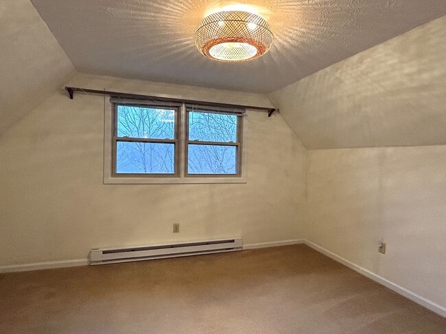 Building Photo - Light-Filled 3BR Home with Wraparound Deck, Convenient to Town